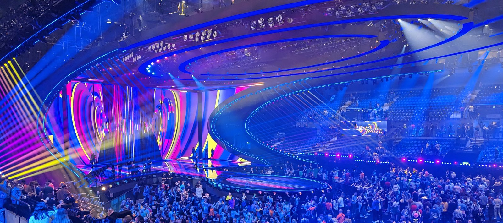Grand Eurovision style concert stage with laser effects and dynamic lighting